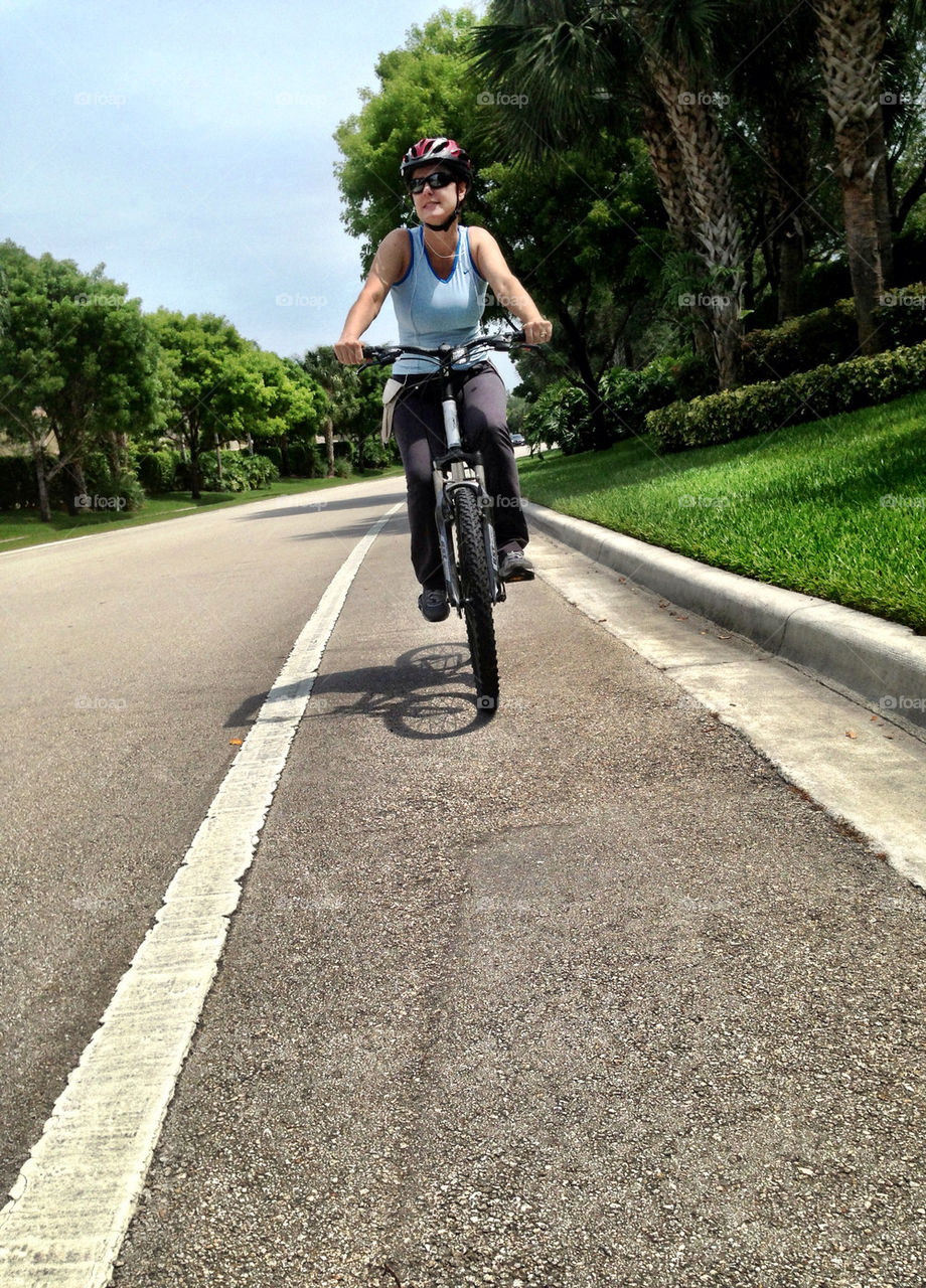 Woman riding bicycle