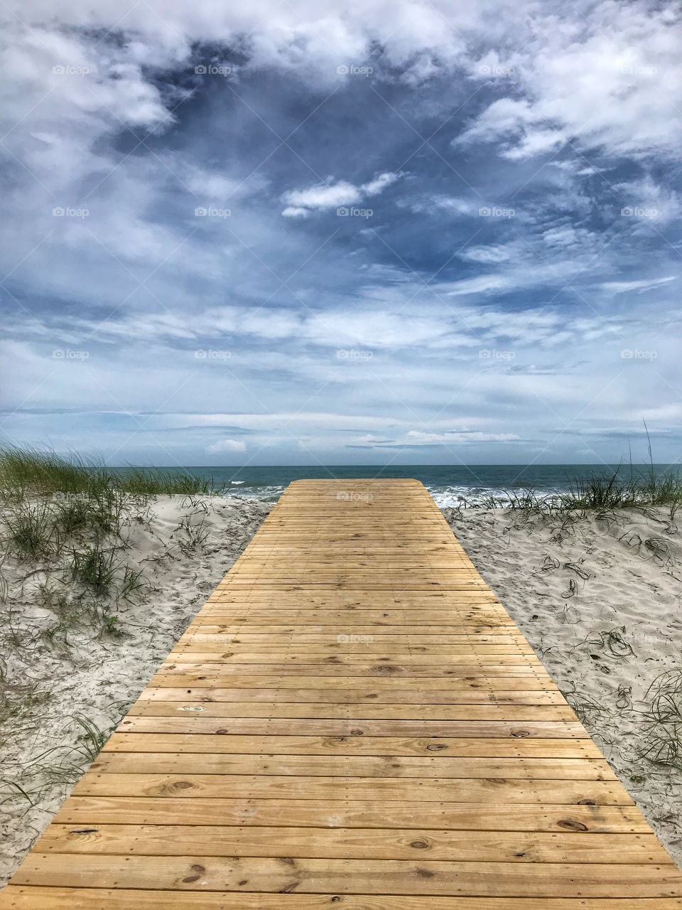 Over the sand dunes access to the ocean 