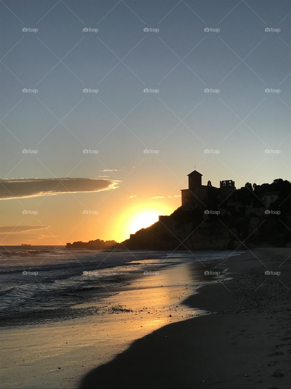 Winter sunset behind a castle