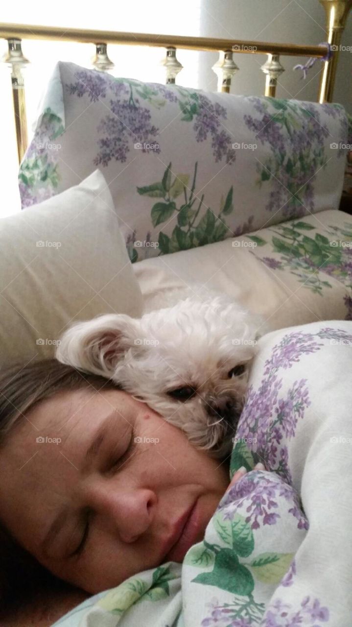 Pixie and I. Taking a nap with my puppy.