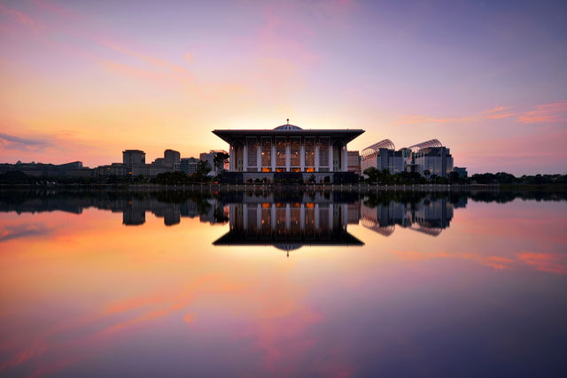 Sunrise reflections over the mosque in Putrajaya Malaysia