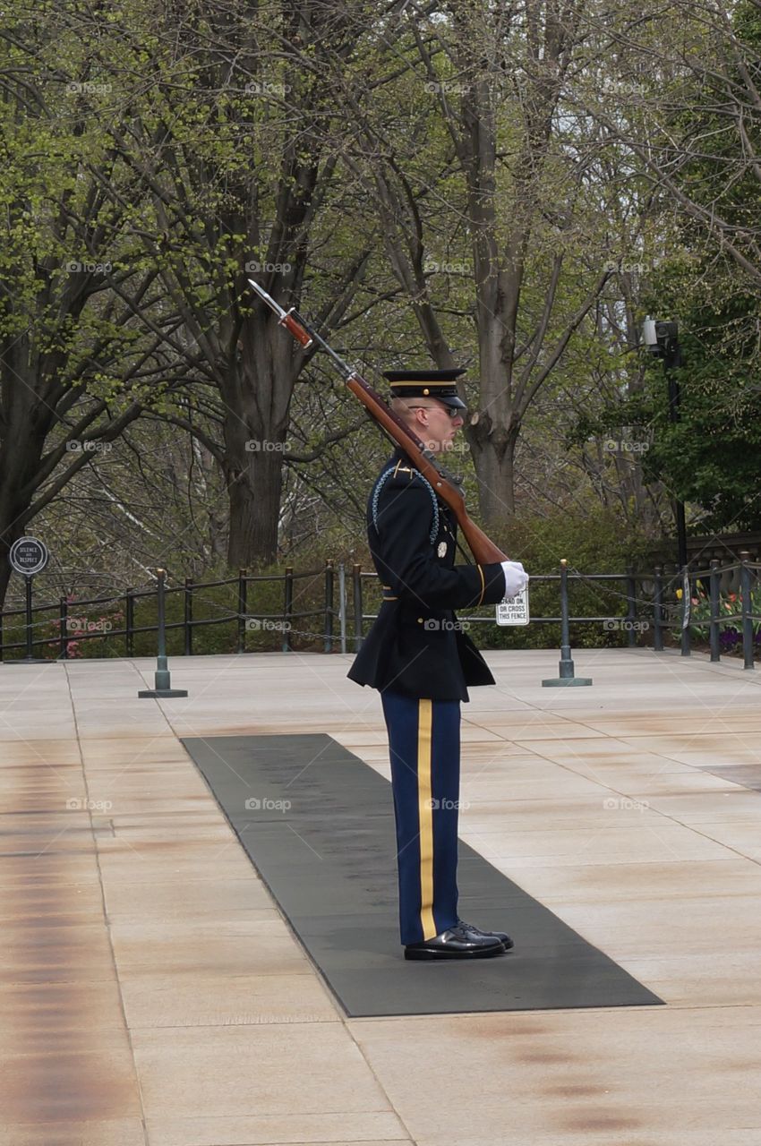 Marching at tomb of the unknown soldier at Arlington Cemetery in Arlington VA, USA.