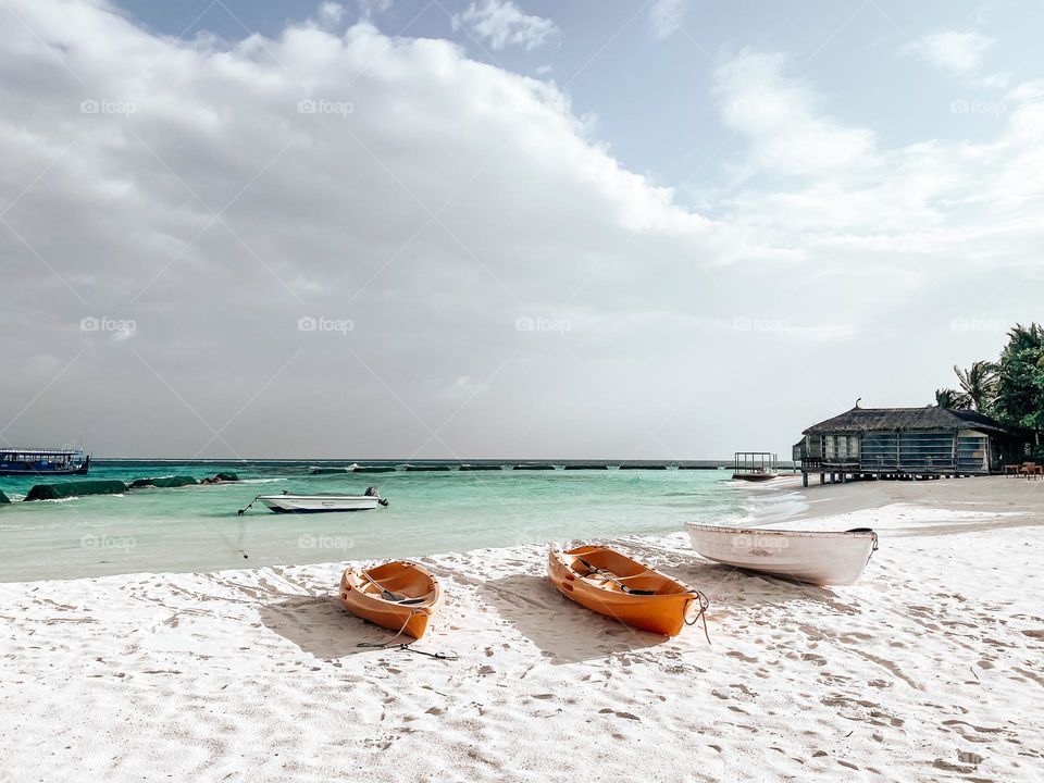 three boats on the beach 