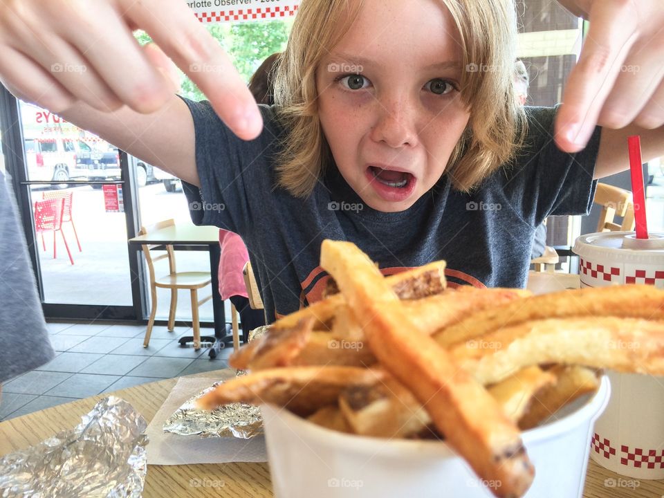 Cute child with french fry