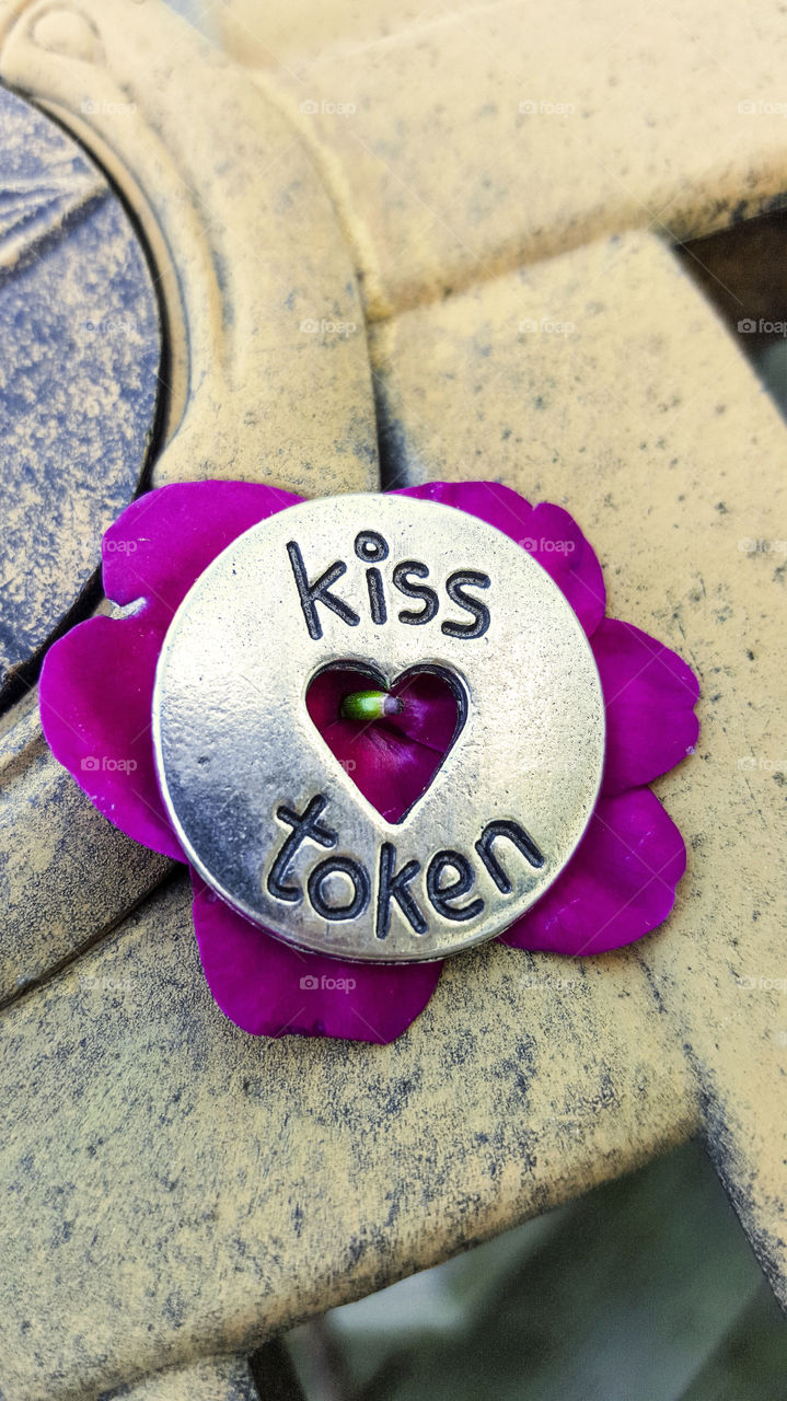 flower with kiss token. token good for one kiss