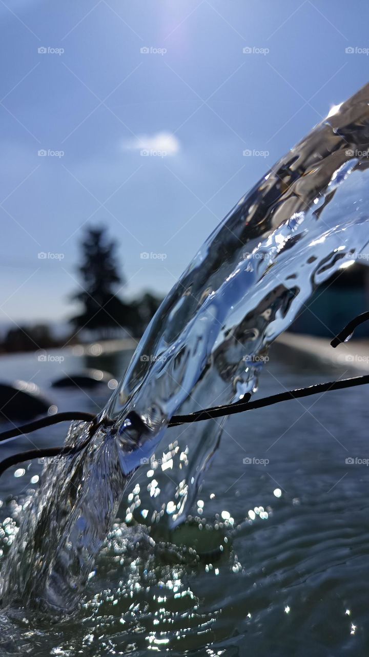 Water, essential for life, sustains ecosystems,nourishes living organisms, and plays a crucial role in various natural processes. It is a universal solvent, facilitating chemical reactions, and its presence is vital for the existence of life on Earth