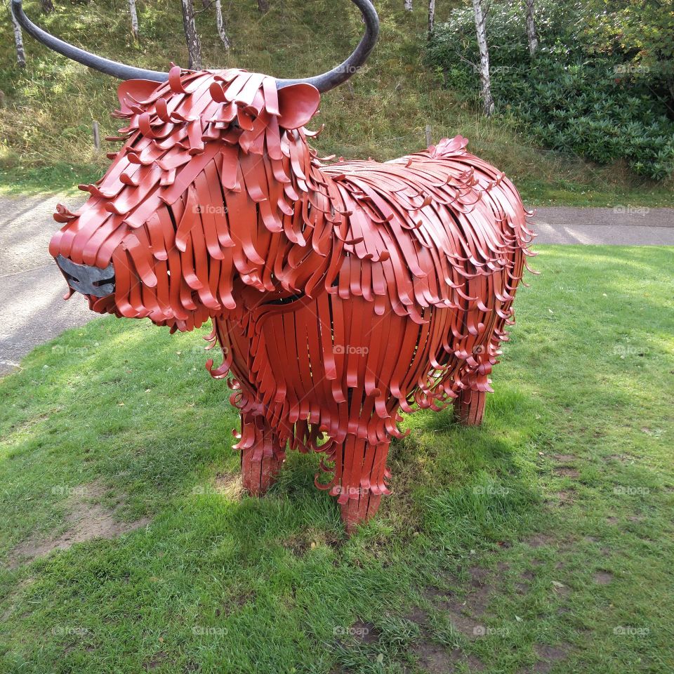 A metal  Highland cow
