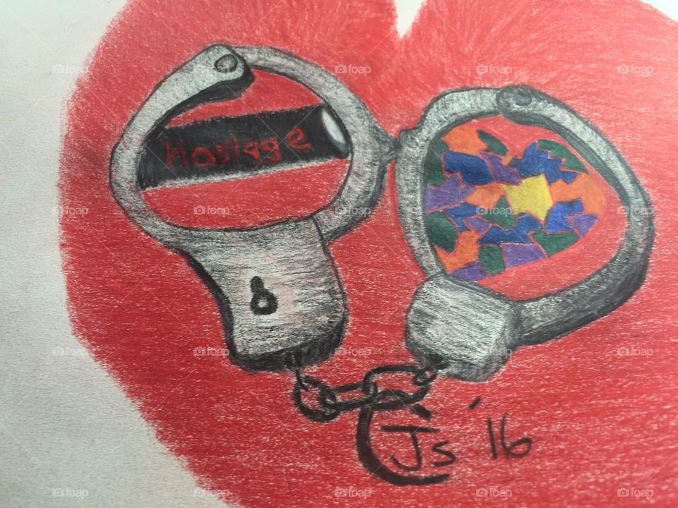 Red heart drawing puzzle, hostage, handcuffs