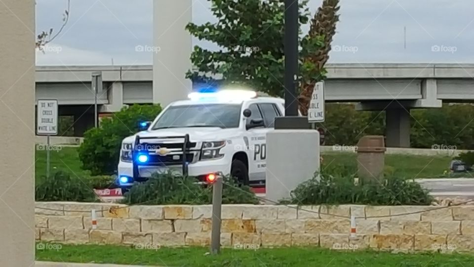 Windcrest Police, Texas. Windcrest Police with emergency lights on during traffic stop.