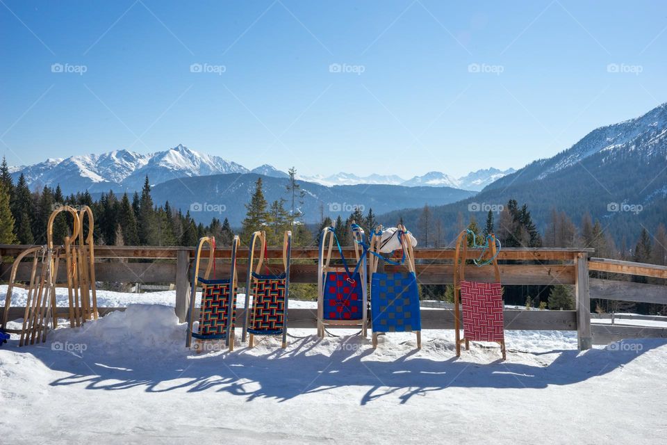 sledges and mountain panorama