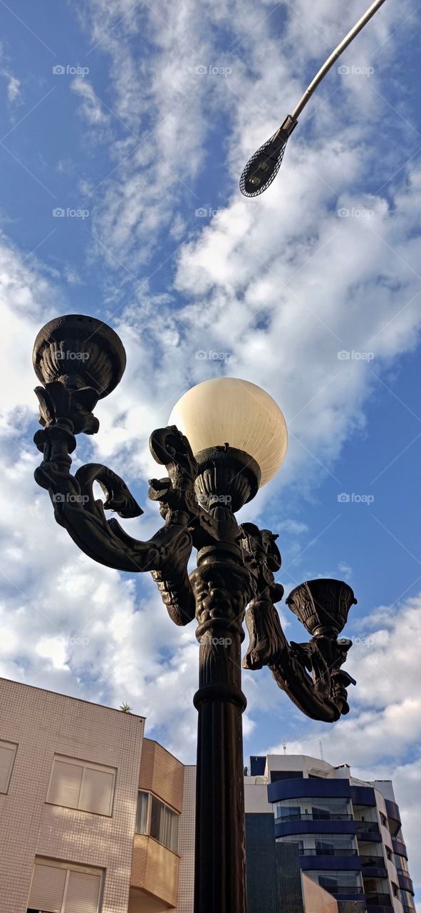 The old and the new, electric power pole