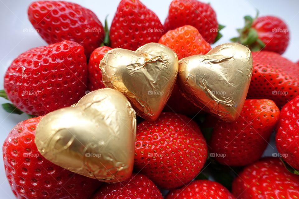Strawberries and heart chocolates