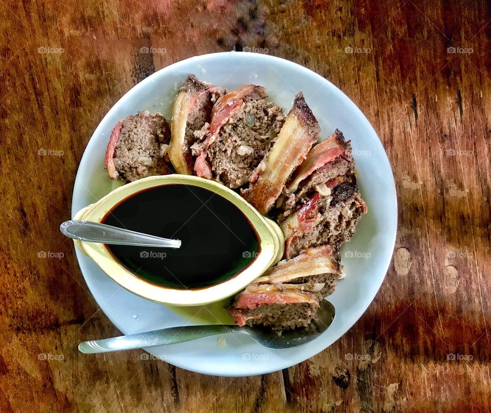 meat loaf stuffed with bacon and sweet and sour honey sauce