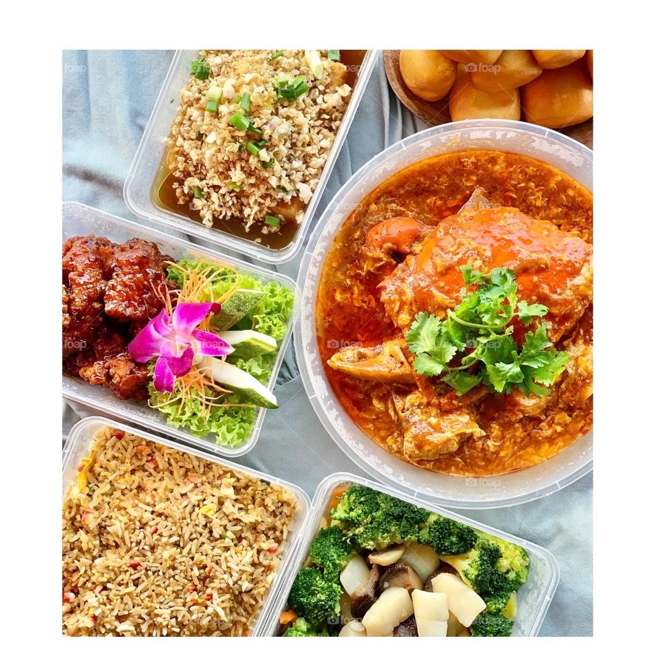 Asian local dishes in tze char style, Chilli crab, coffee pork ribs, caipo beancurd, broccoli with scallops and classic fried rice 