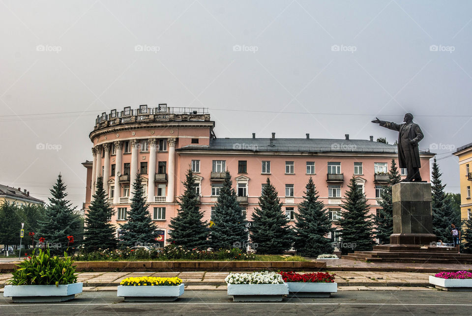 Trees and flowerpots on Lenin Square