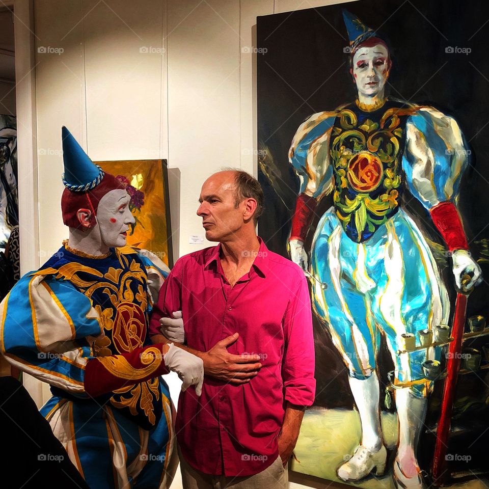 Gensi the Clown two times (in real and on the painting) and the painter Martin Stommel on a Vernissage in Vienna 