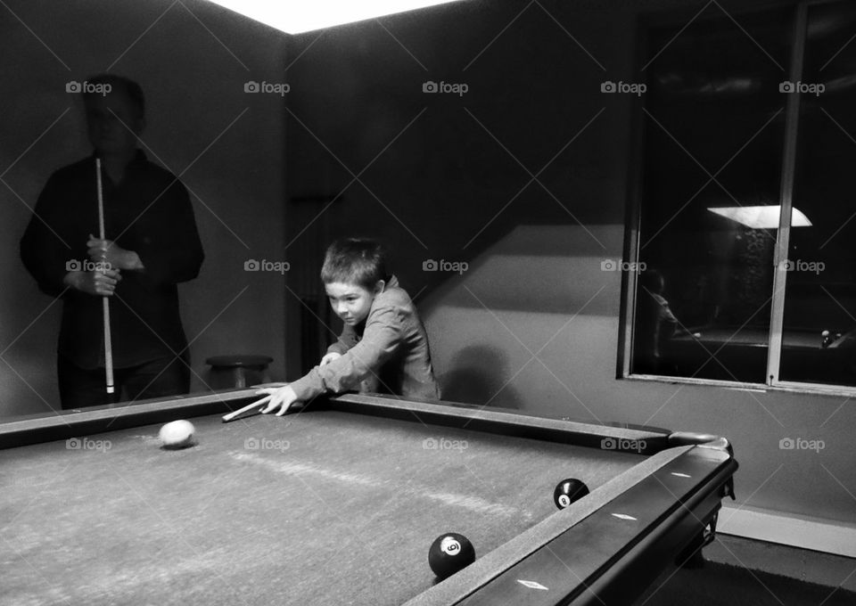 Boy Shooting Billiards