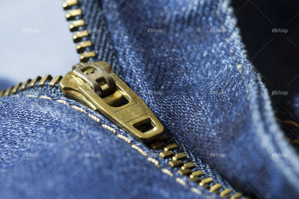 close-up blue jeans zipper
