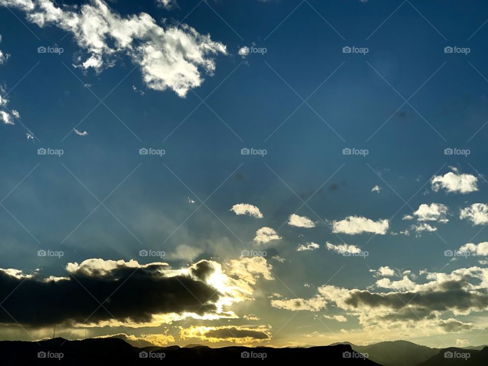 Sunset over the mountain range.