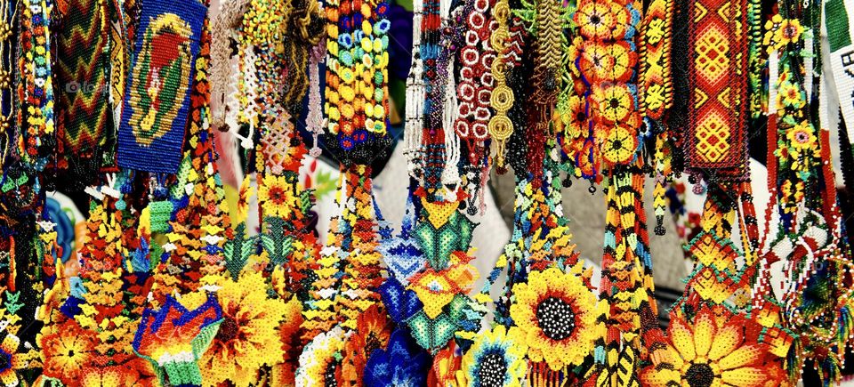 Bright and colourful belts at the market.