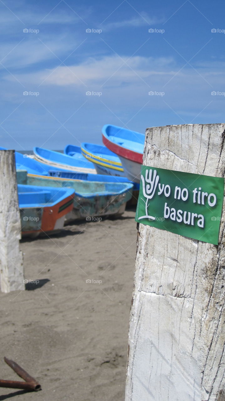 International coastal cleanup day in Nicaragua; sticker says "I don't litter".