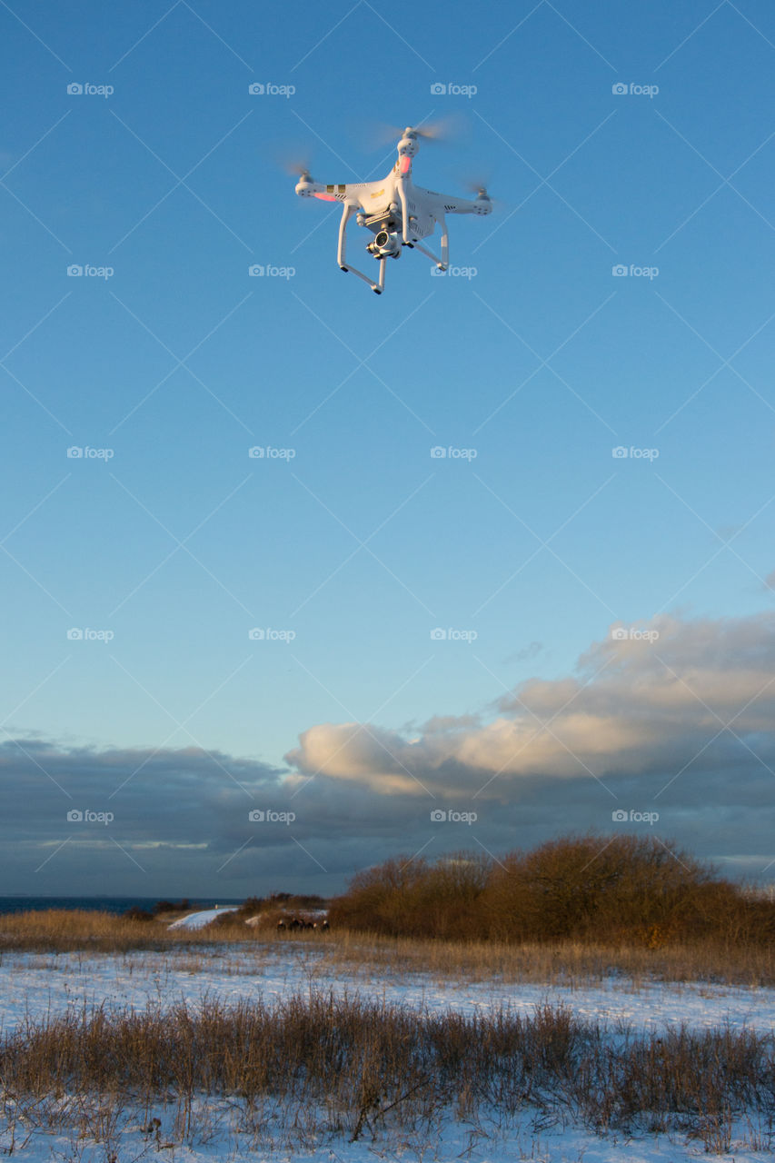 Phantom drone in the air taking pictures.