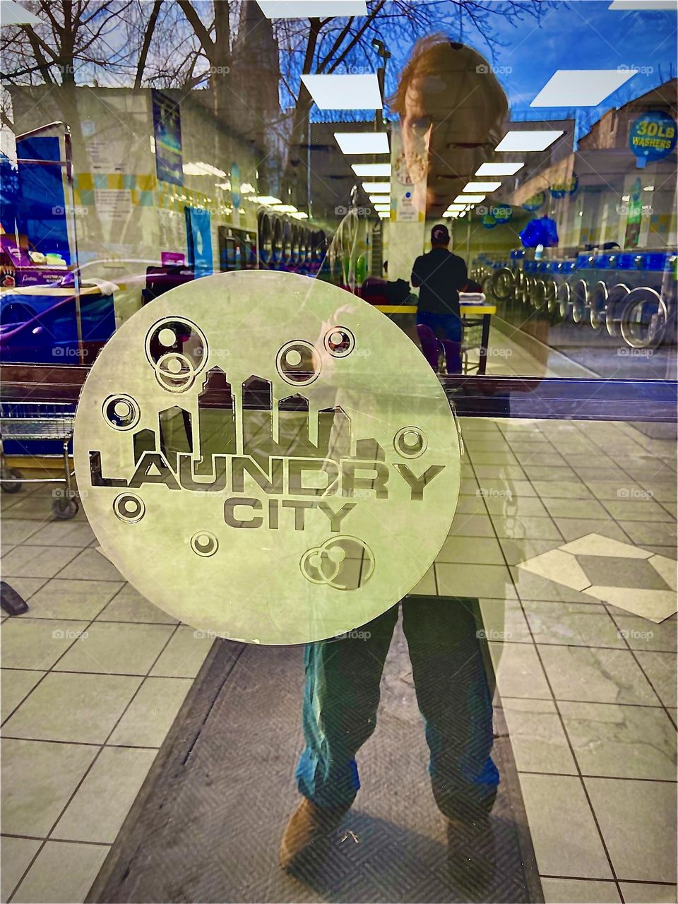 Timothy is pausing for a moment of “REFLECTION” (literally) in front of “Laundry City”, the laundromat of choice for people at “Newtown Creek” in LIC, Queens. We’ve been doing our washing here for several years. 2022. Hypnotic Productions