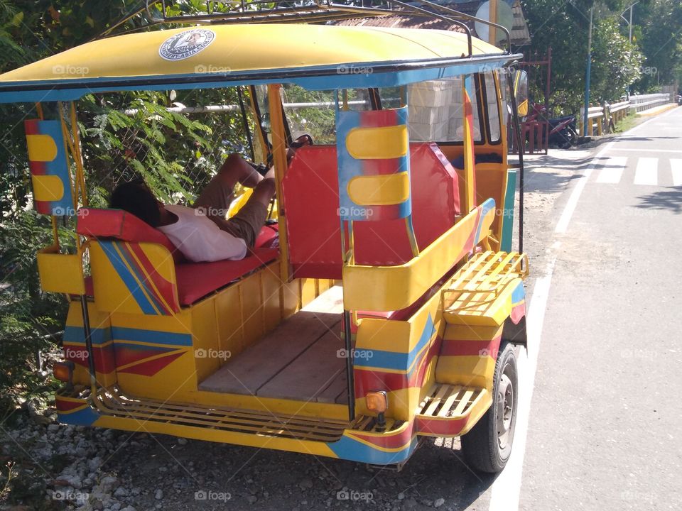 Sleeping pedicab driver