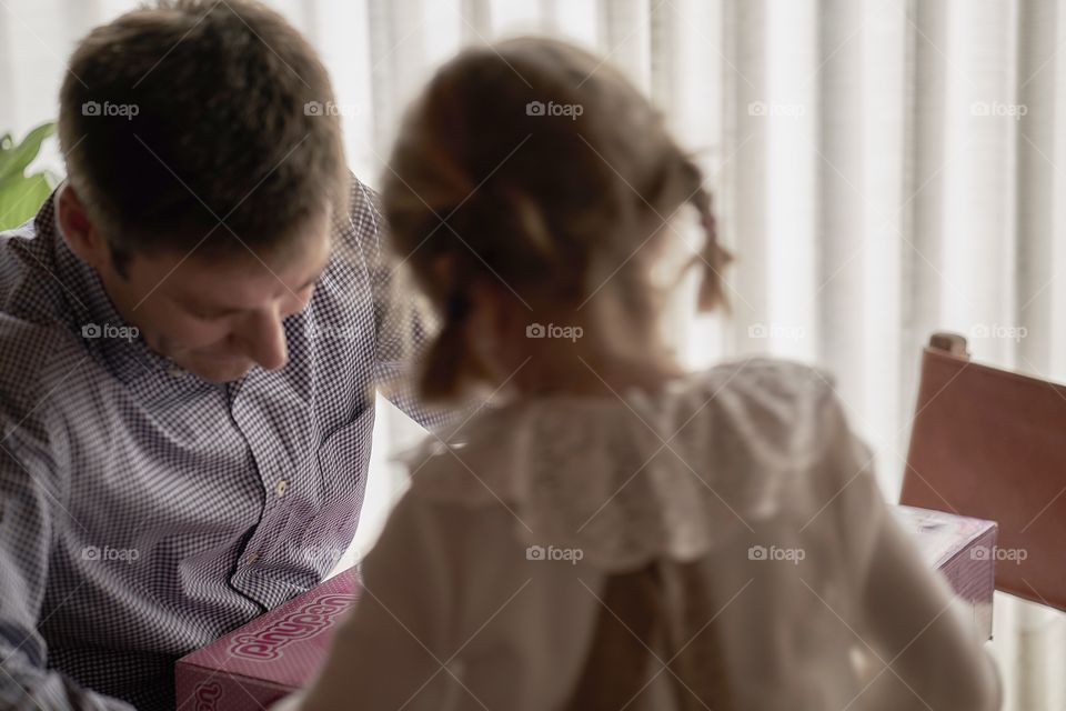 Close-up of father and daughter