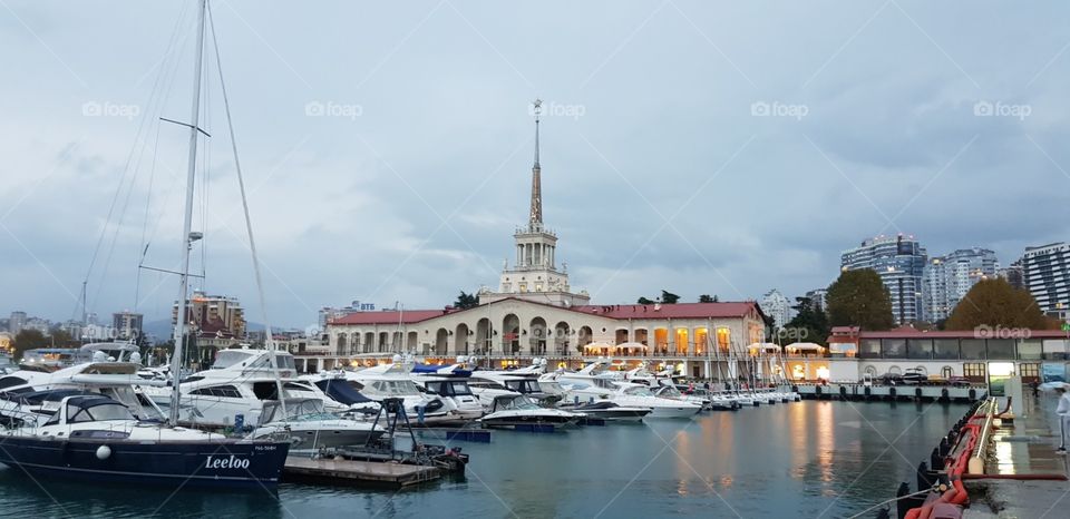 Marine station with unique architecture in Sochi; boats in the front