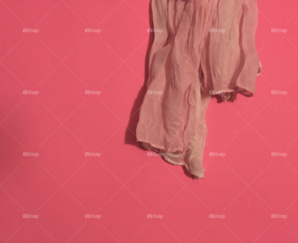 Pink scarf and pink background 