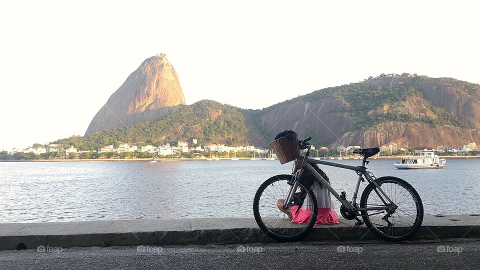 Girl with a bike relaxing in Rio de Janeiro , Brazil