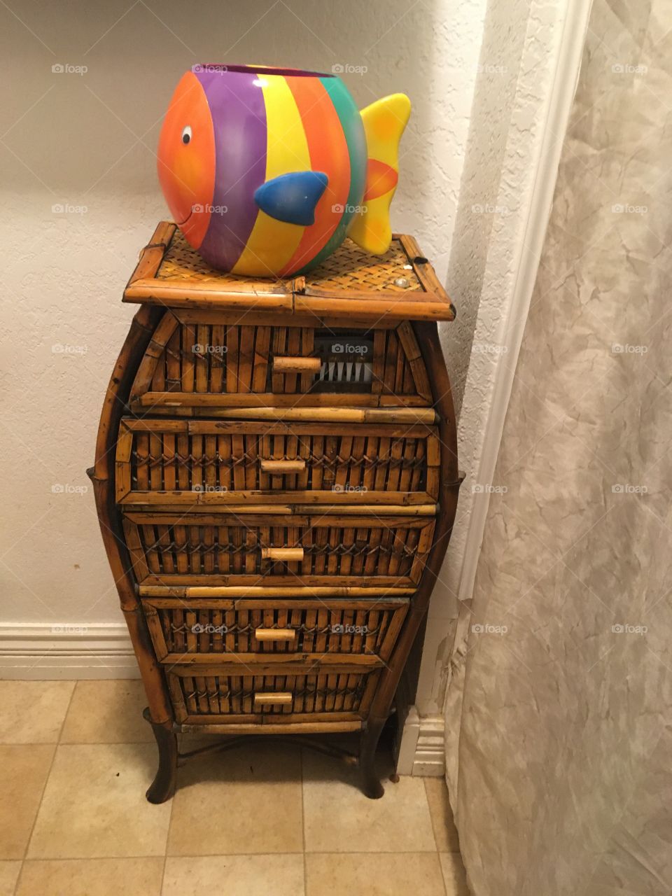 One fishy out of water sitting on his stand smiling and being happy, No worries.