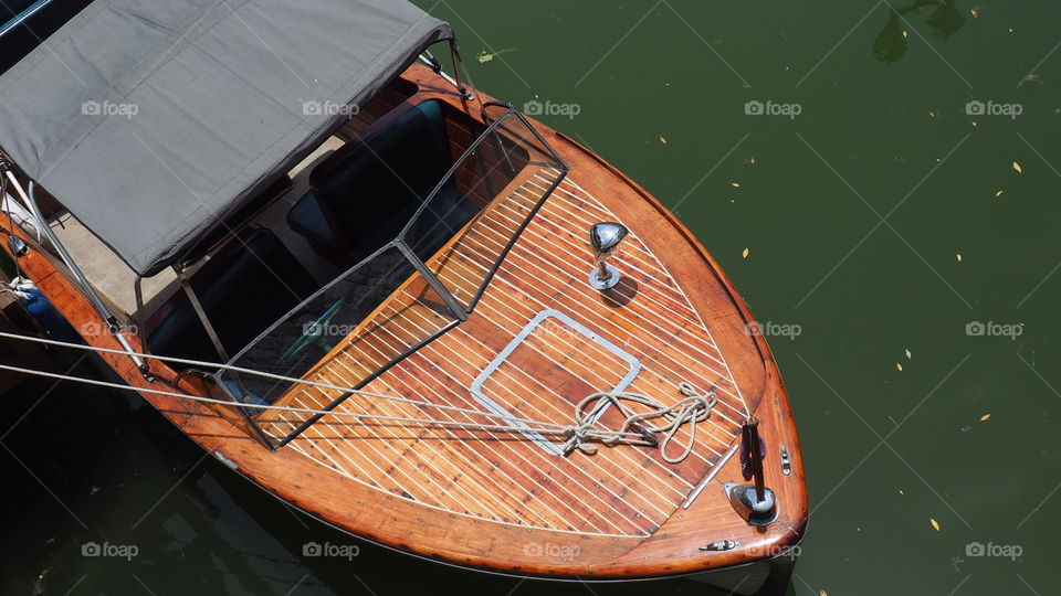 Vintage motorboat. Vintage motorboat at rest, docked