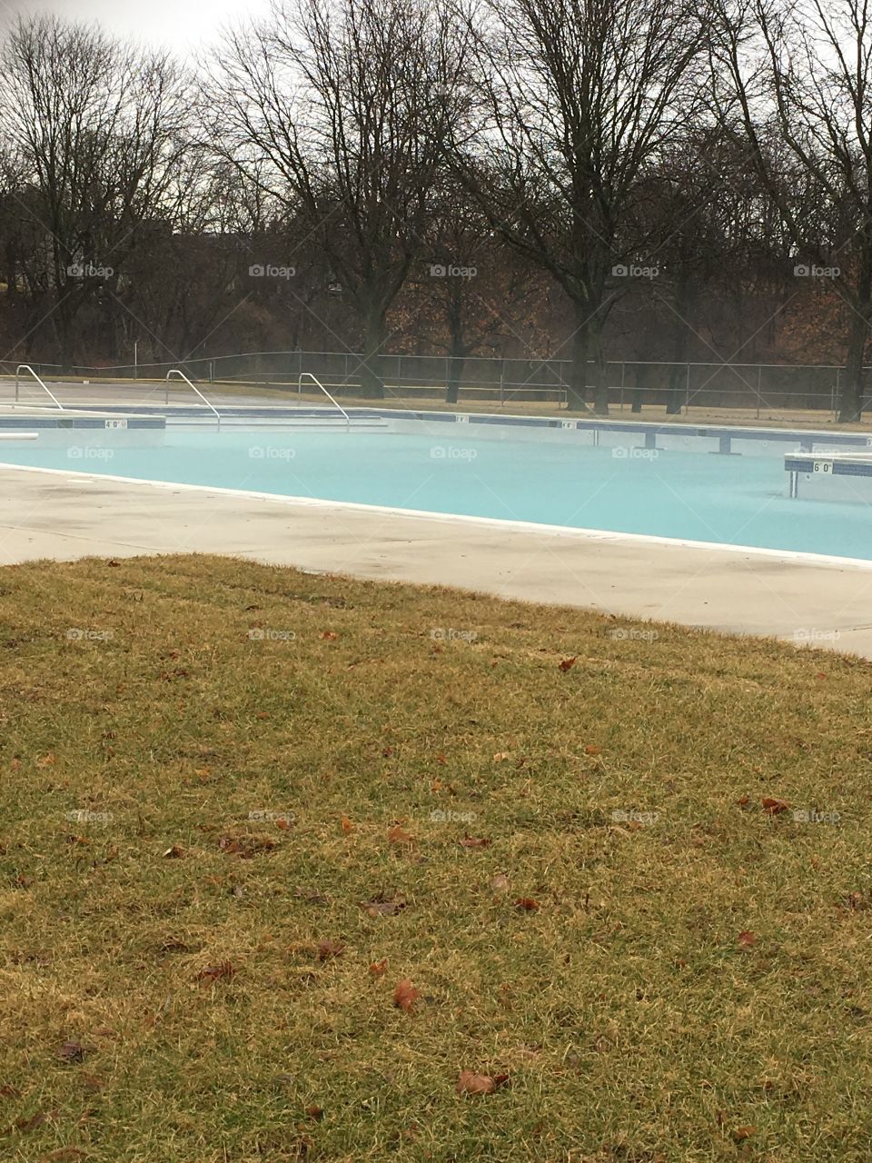 Foggy pool water in a cold winter