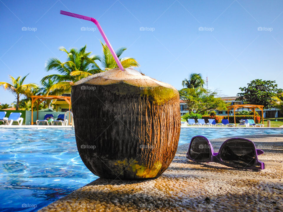 Refreshing coconut water by the pool side