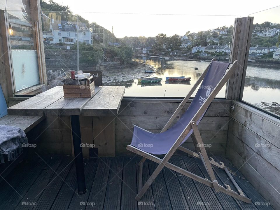 Outdoor decking area belonging to The Swan Inn Noss Mayo, Devon 