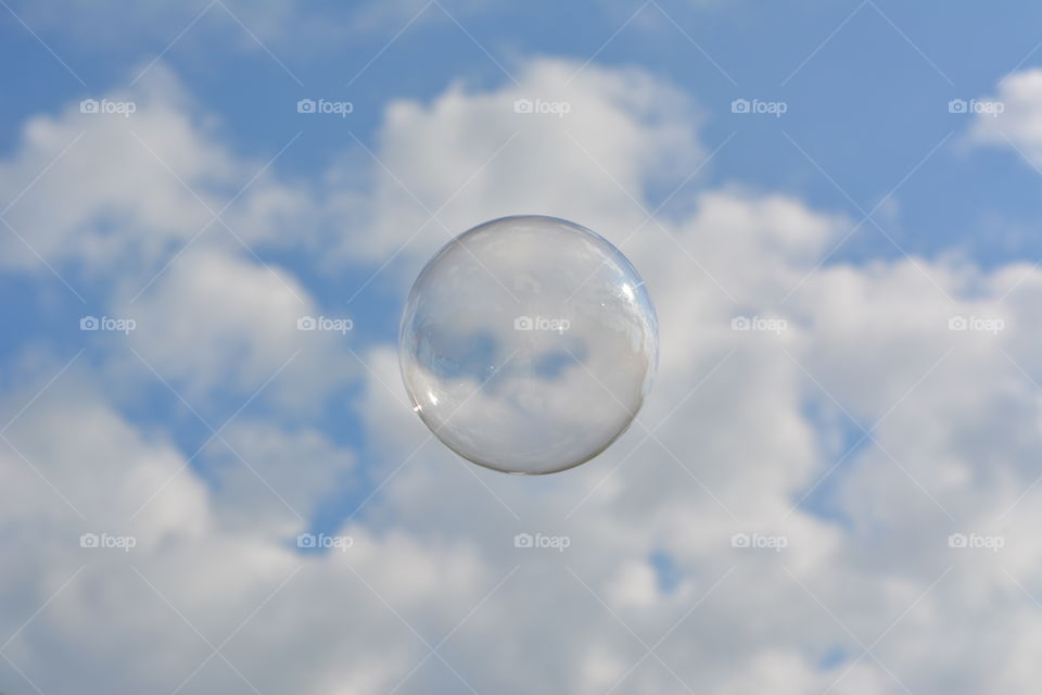 View of bubble against cloudy sky