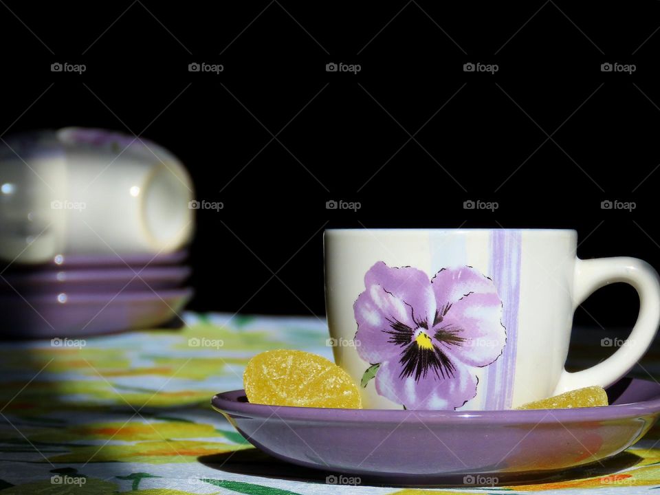 A cup of coffee and marmalade