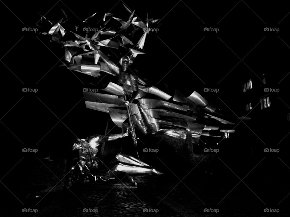 Monochrome photography of a monument located nearby the post office that played a heroic role in Gdańsk, Poland during WWII.