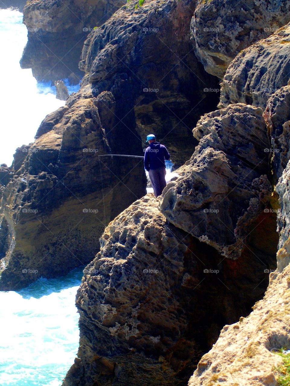 Fisherman on the cliff