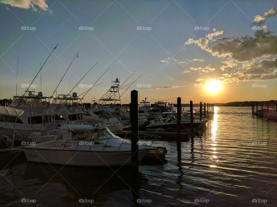sunset view with yachts and boats
