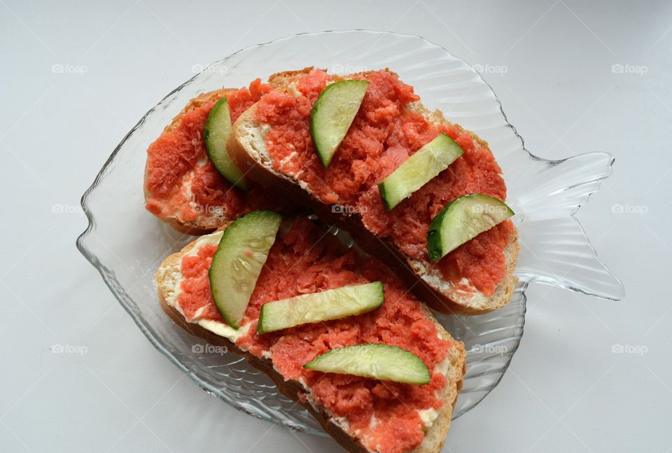 sandwiches with red fish and cucumber