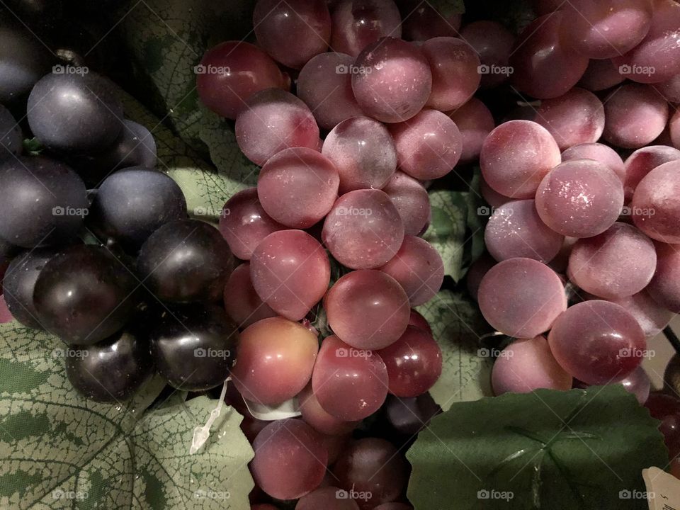 These grapes once again look so very real and so very perfect, but they are fake, but have an enjoyable presence about them.