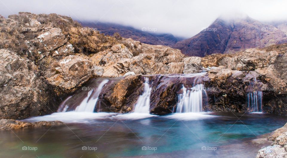 Cascades at the Fairy Pools, Isle of Skye, Scotland on a misty day