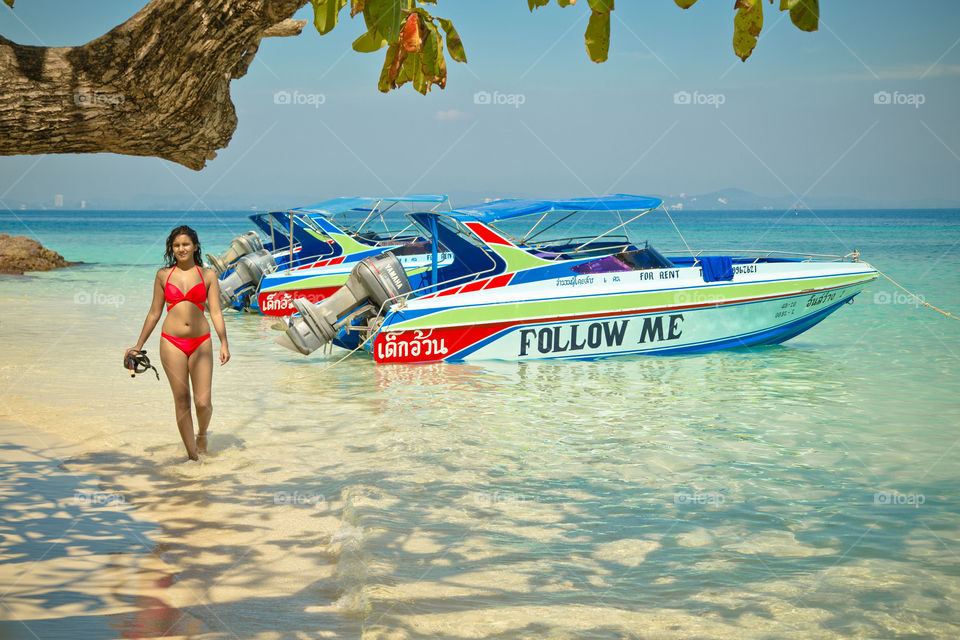 Follow me... to paradise. sexy tourist on a beach