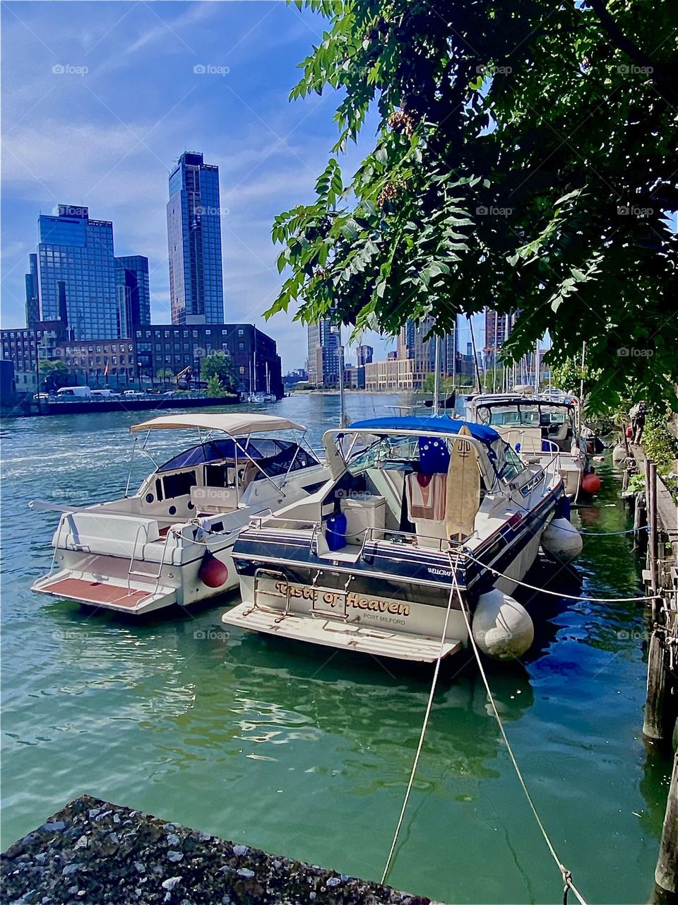 A large commercial barge has left quite a wake here at “Newtown Creek” by the “Pulaski Bridge” in LIC, Queens as evidenced by the wavy unruly water of the “East River”. 2023. Hypnotic Productions