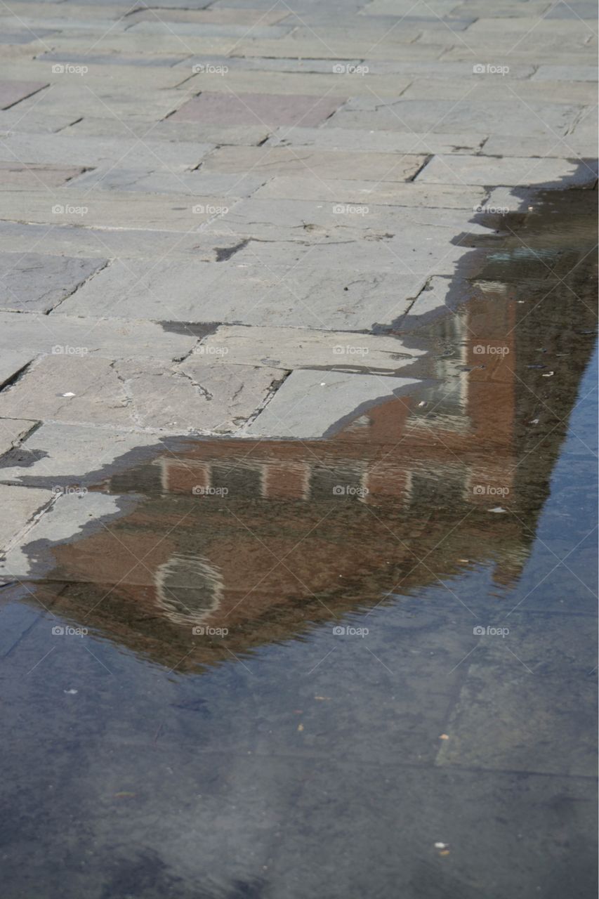 Reflection of Pontalba Apartments in New Orleans’ Jackson Square