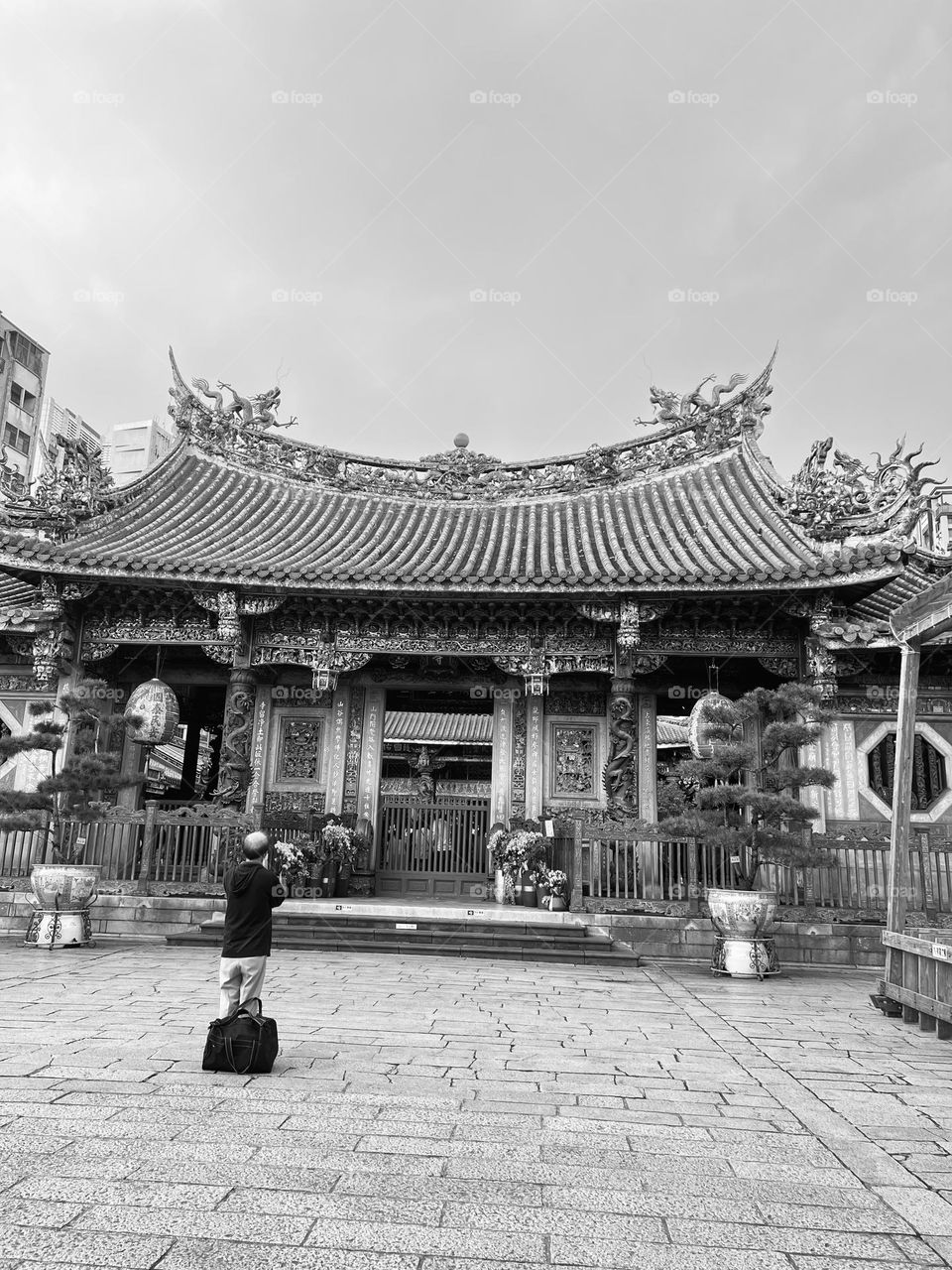 A person worshipping in the temple 
