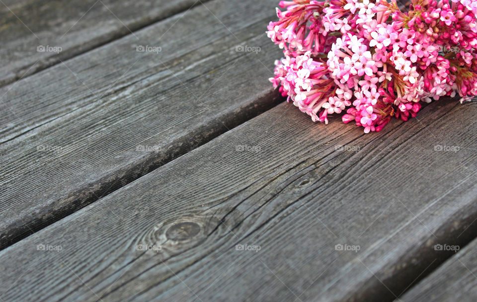 wood background with flowers